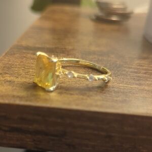 Elegant Gold and Yellow Gemstone Ring